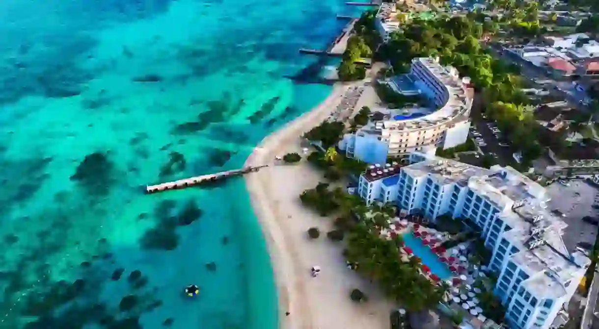 Aerial view of Montego Bay waterfront with hotel and beaches.