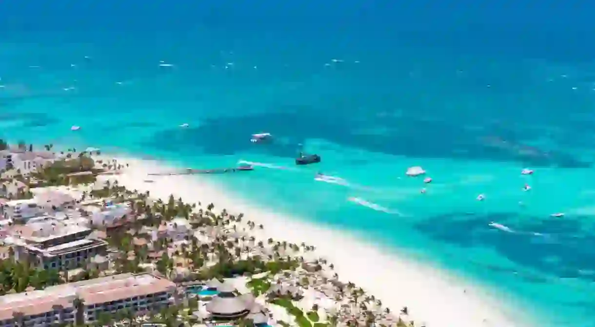 Aerial view of beautiful tropical white sand Los Corales beach in Punta Cana.