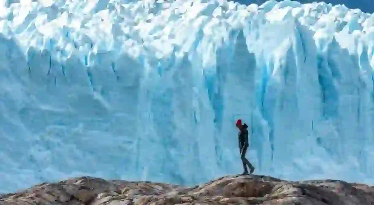 A woman on the rock, Perito Moreno Glacier