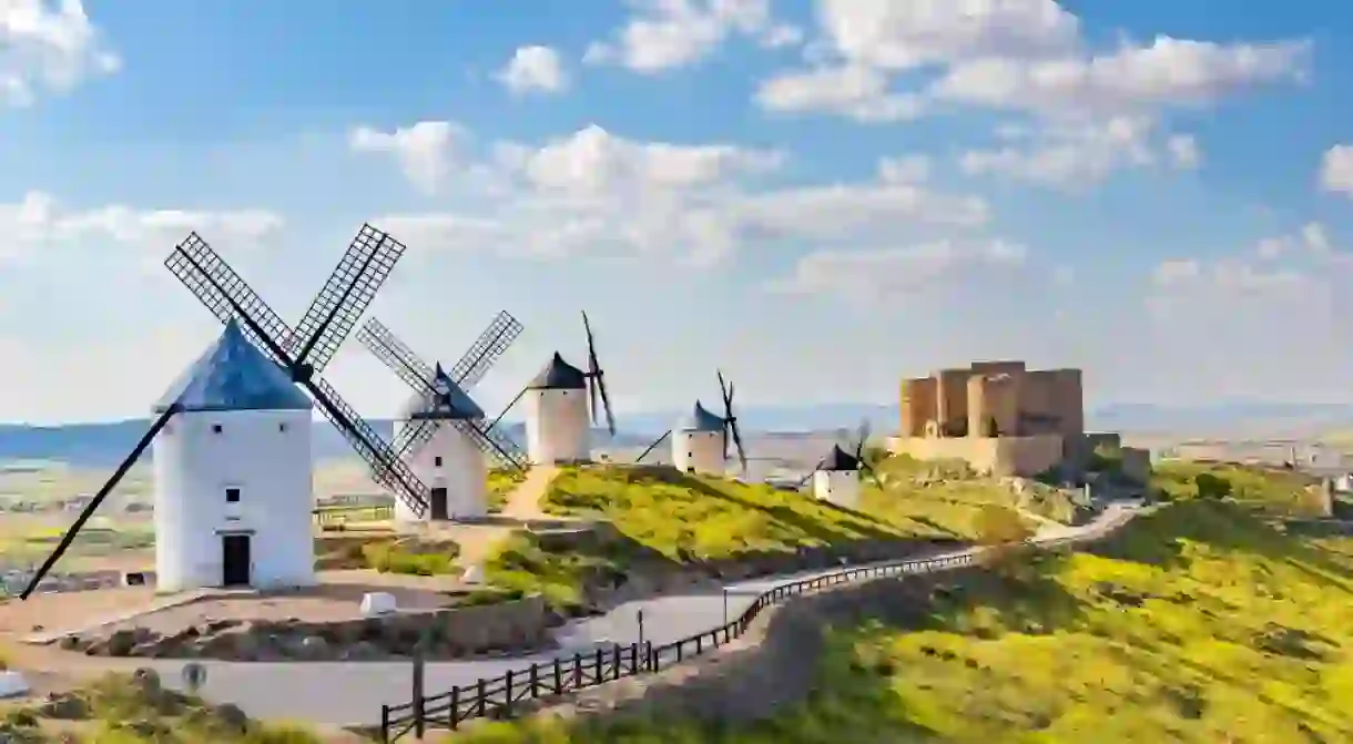 landscape mill spain clouds and castle La Mancha Consuegra with