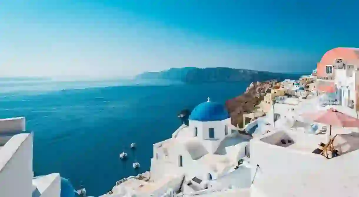 Oia views, an iconic sunset feature of the Greek island of Santorini in Cyclades Archipelago, Aegean Sea, Greece.